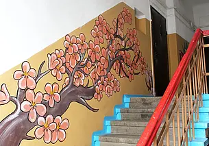 И ветка сакуры на стене