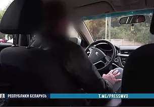Водитель минского такси помог задержать курьера телефонных мошенников