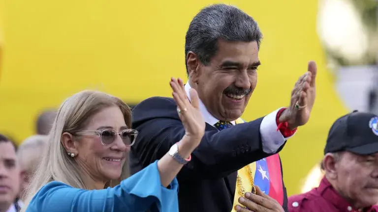 Президент Венесуэлы Николас Мадуро и его жена Силия Флорес Фото: AP.